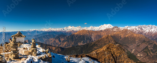 Panoramic view of Himalayas mountains from Chandrashila summit, Chopta. Chandrashila is a peak in the Himalayan ranges in Uttarakhand state of India at an altitude of 12,083 ft from the sea level. photo