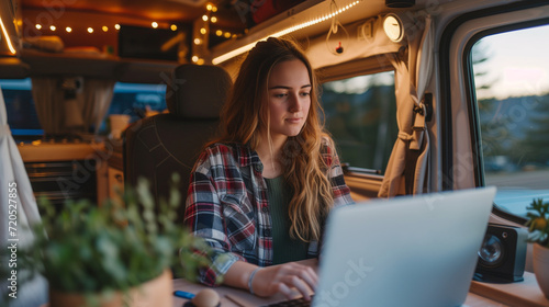 Young Woman Enjoying Remote Work in Cozy Camper Van life - Digital Nomad Lifestyle, Travel, Adventure, Freelance, Work-Life Balance, Mobile Office, Nature