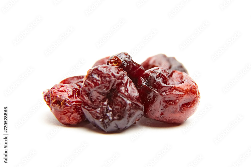 Dried cranberries isolated on white background. Sweet red berries closeup Dried cranberries isolated on white background. Sweet red berries closeup