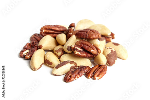 Brazil nuts and peeled pecans mix isolated on white background. Tasty and raw nut medley