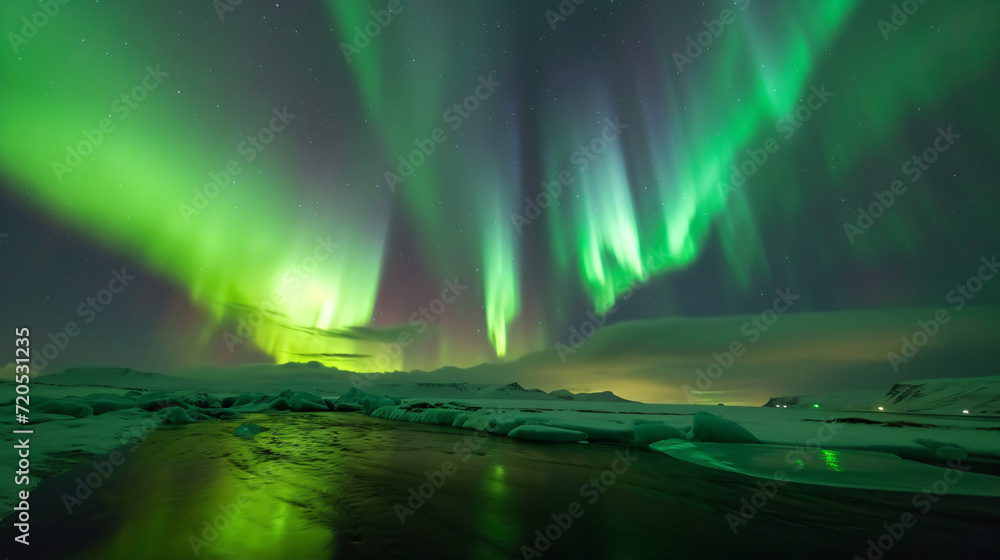 A breathtaking view of the Northern Lights in Iceland with vibrant colors dancing across the night sky.