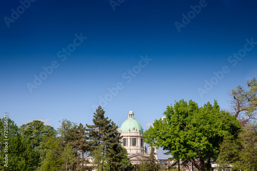 Picture of narodna skupstina, the national Assembly of Serbia,seen from a nearby park. The House of the National Assembly of the Republic of Serbia is the seat of the National Assembly of Serbia. The  photo