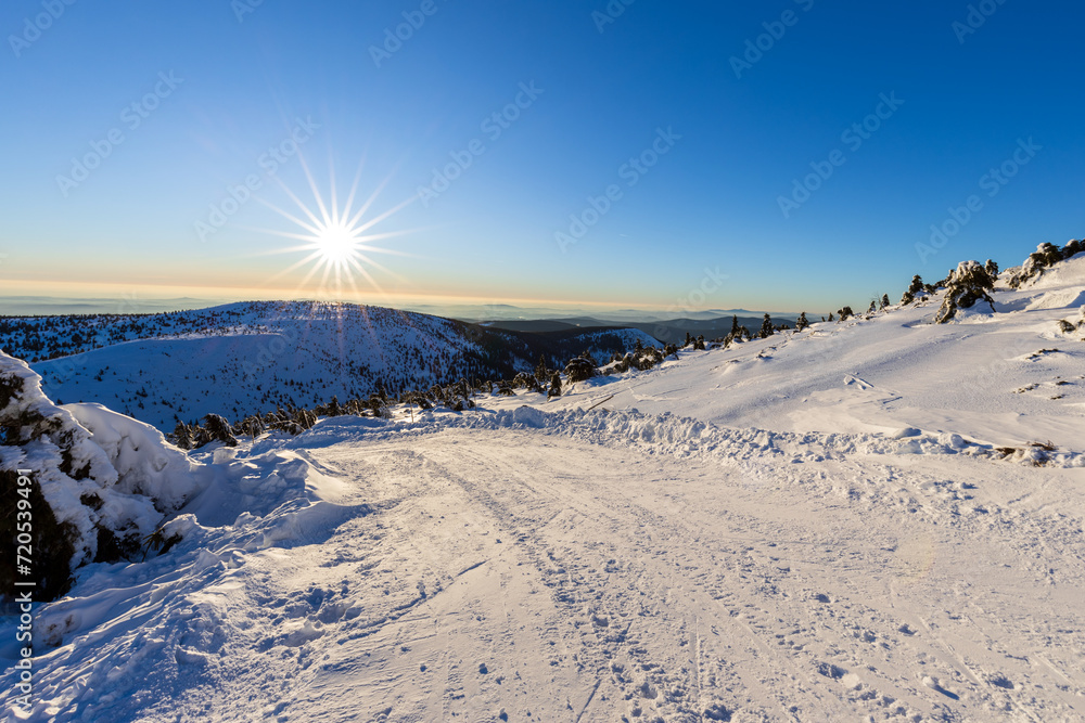 View of winter mountain landscape at sunset, the Giant mountains.
