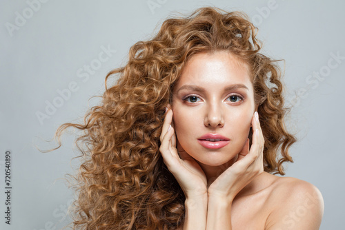 Perfect female model beauty portrait. Natural beauty woman with long hair and prfect fresh clear skin. Cosmetology, facial treatment, skincare and hair styling concept