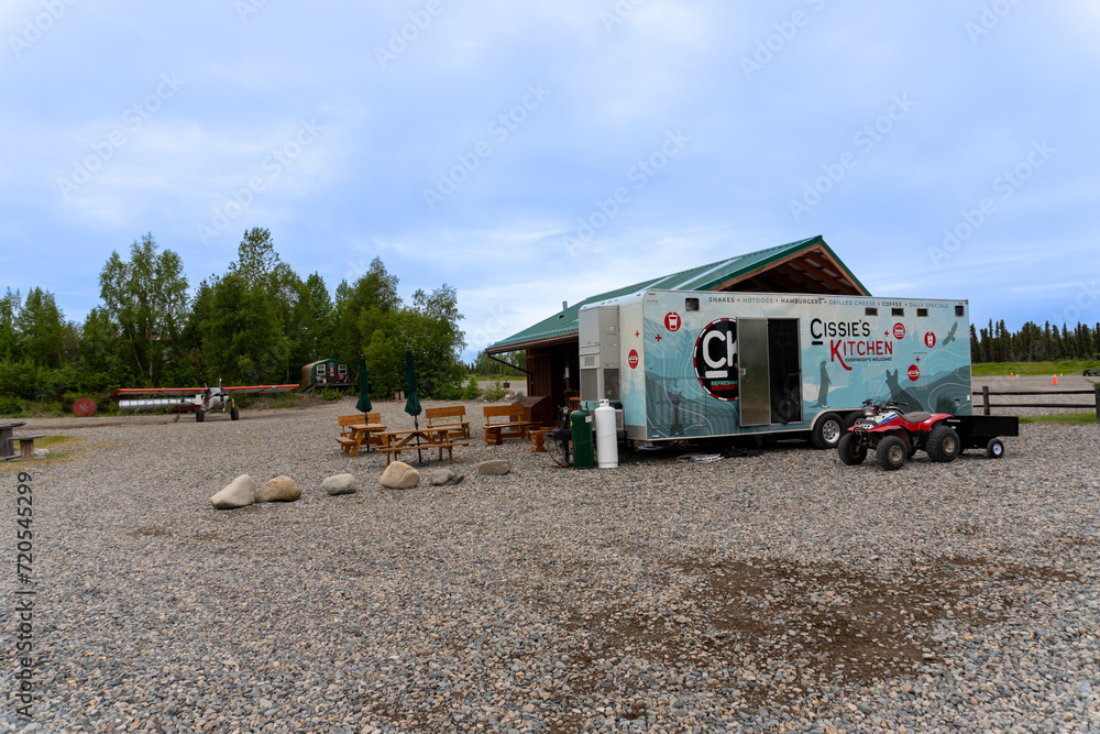 Port Alsworth, Alaska Cissie's Kitchen food truck with airplane parking near gravel airstrip