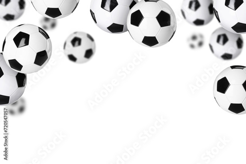 Many soccer balls falling on white background © New Africa
