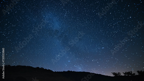 A background of a clear night sky with twinkling stars providing a sense of wonder and the vastness of the universe.
