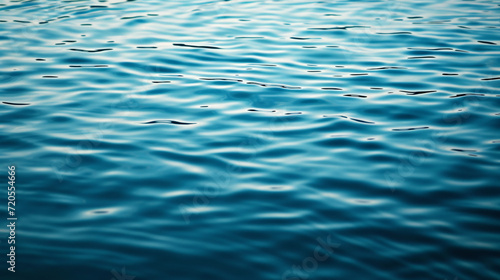 A background of a smooth reflective water surface with subtle ripples conveying a sense of calmness and purity.