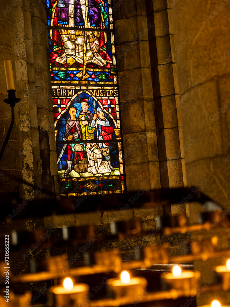 Obraz premium Stained glass windows of Gothic Collegiate church of Santa María, Navarra, Roncesvalles, Spain.