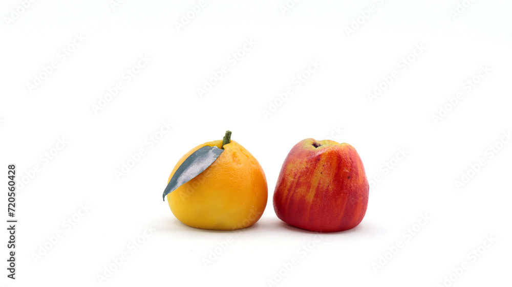 closeup of marzipan fruit on white background closeup of marzipan fruit on white background