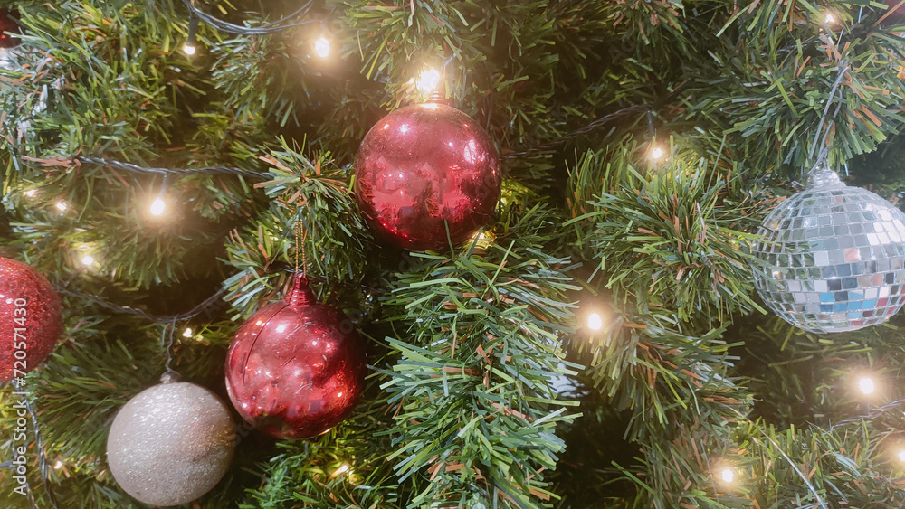 Decorated Christmas Tree with Ornaments and Festive Decorations in Green, Red, and Gold for the Holiday Celebration