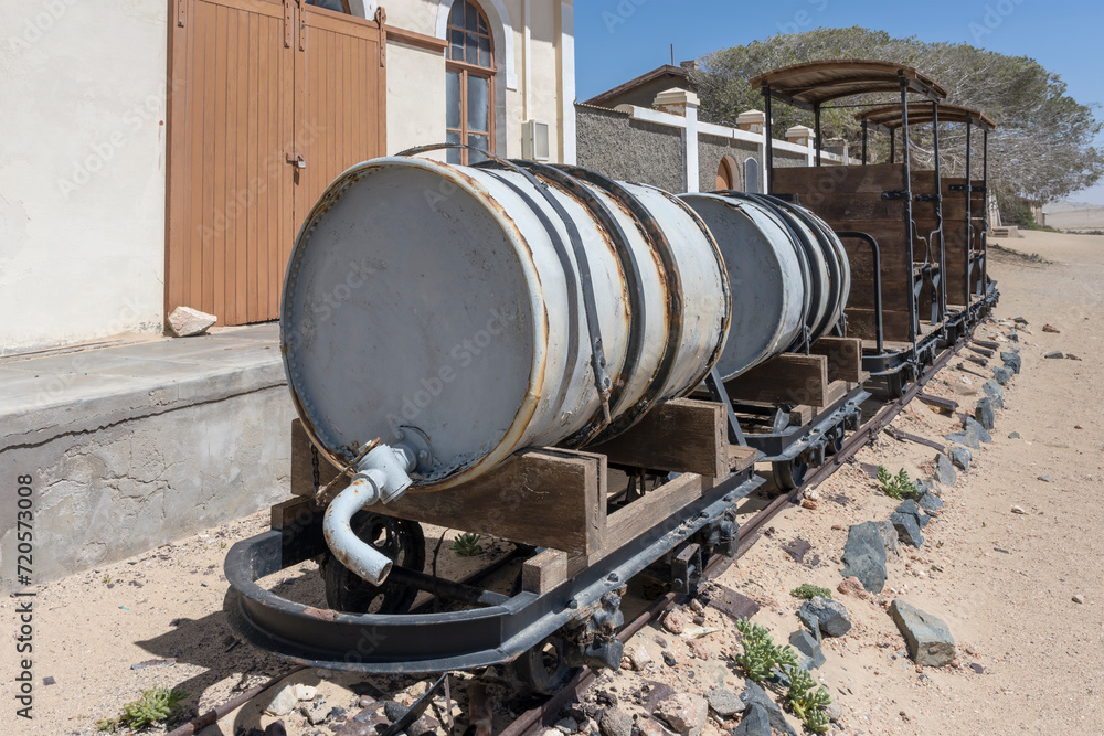 old little water train at mining ghost town in desert, Kolmanskop, Namibia old little water train at mining ghost town in desert, Kolmanskop, Namibia