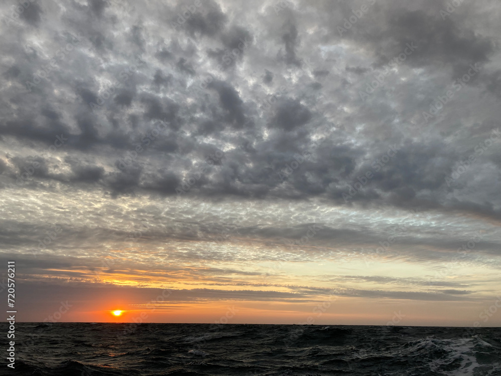 clouds and sunset over the ocean