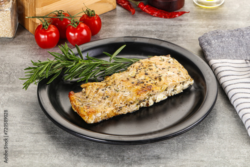 Baked salmon fish served rosemary