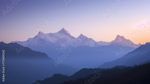 A peaceful sunrise over the Himalayas showcasing the majestic peaks and serene mountain landscape.