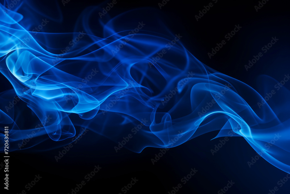 jets of vibrant blue smoke on a black background. abstract texture of flying smoke.
