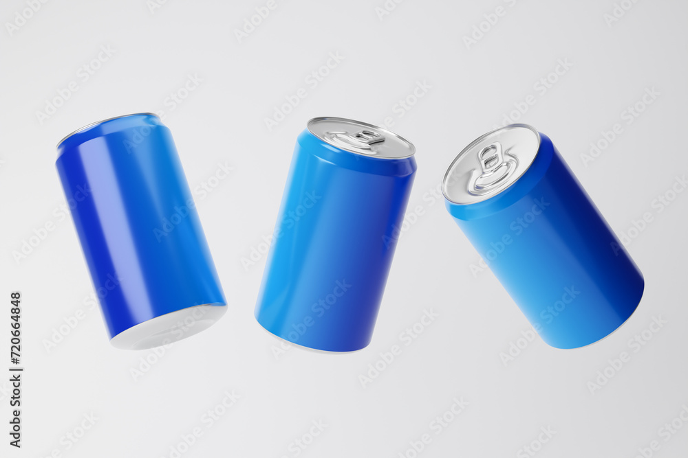 Falling blue aluminum soda cans isolated over white background. Mockup template. 3d rendering. Falling blue aluminum soda cans isolated over white background. Mockup template. 3d rendering.