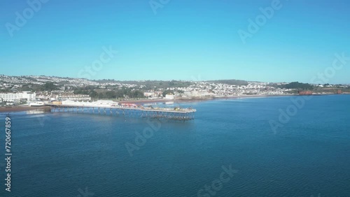 Wallpaper Mural Paignton, Torbay, South Devon, England: AERIAL VIEWS: The drone circles the major landmark and tourist attraction of Paignton Pier. Torbay is a popular English holiday resort with many attractions. Torontodigital.ca