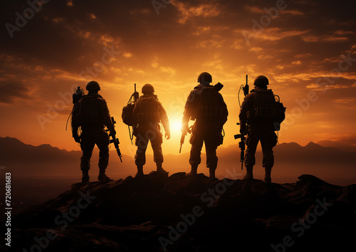 Silhouette of a group of Soldiers at sunset