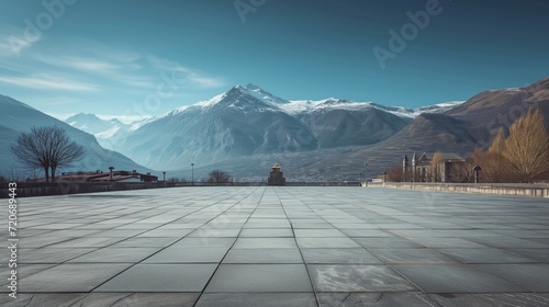 Mountain View from a Paved Square with Blue Sky