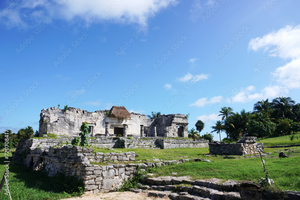 Tulum, Quintana Roo, Mexico - December 15, 2023: View of The Great Palace ruins at Tulum, The Maya City of the Dawning Sun.