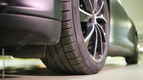 Reduction of clearance of modern car, close up of wheel photo