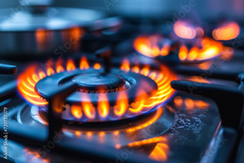 A gas stove with the fire burning, gas energy concept