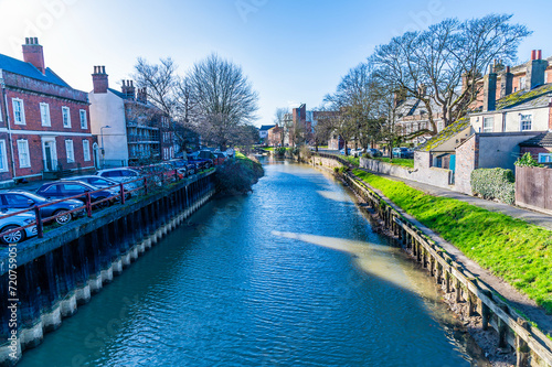 A view southward down the River Welland in Spalding, Lincolnshire on a bright sunny day photo