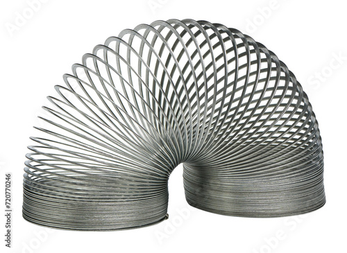 Metal slinky toy isolated on white bkg