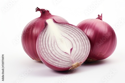 Fresh whole and sliced red onion isolated on white background