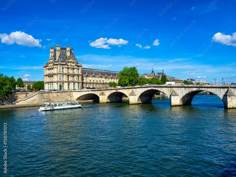 Naklejka premium Seine river and Pont Royal (Royal bridge) in Paris, France. Cityscape of Paris. Architecture and landmarks of Paris.