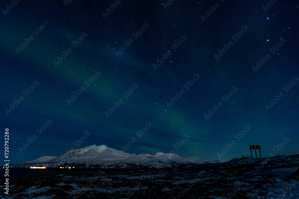 Northern lights night in Tromso in Norway ona cold night in winter 