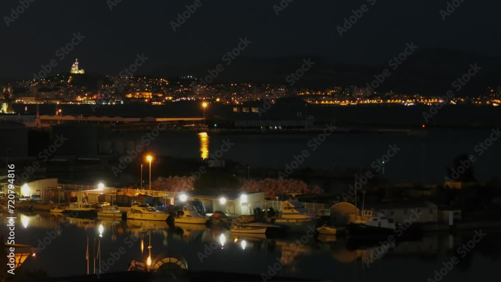 Townscape with vessel in port at evening during sundown. Townscape with vessel in port at evening during sundown.