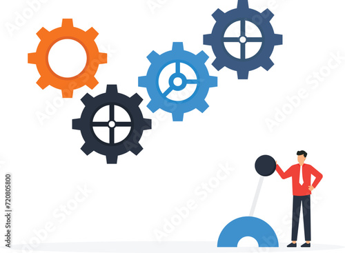 Business workflow and leadership to drive team and initiate productivity and efficiency working process, Businessman manager use all his power and skill to rotate a group of cogwheels gear concept,
