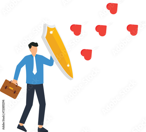 Businessman protecting himself from relationship heart and self preservations and well being emotions concept,

