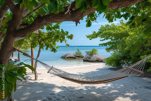 Secluded beach hideaway with private cabanas and hammocks photo