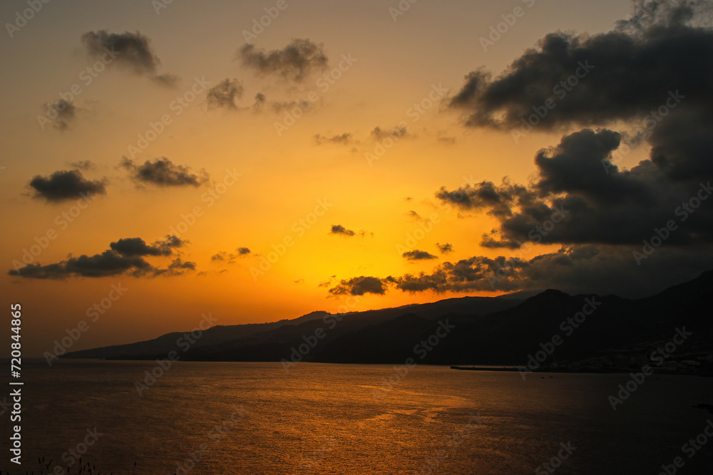 Sunset at the Ponta de São Lourenço (tip of St Lawrence) at the easternmost point of Madeira island (Portugal) in the Atlantic Ocean Sunset at the Ponta de São Lourenço (tip of St Lawrence) at the easternmost point of Madeira island (Portugal) in the Atlantic Ocean