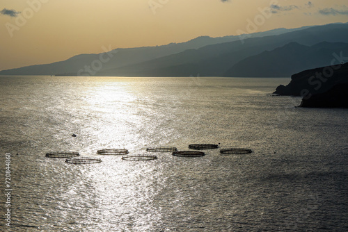 Fish farm in the waters of the Ponta de São Lourenço (tip of St Lawrence) at the easternmost point of Madeira island (Portugal) in the Atlantic Ocean