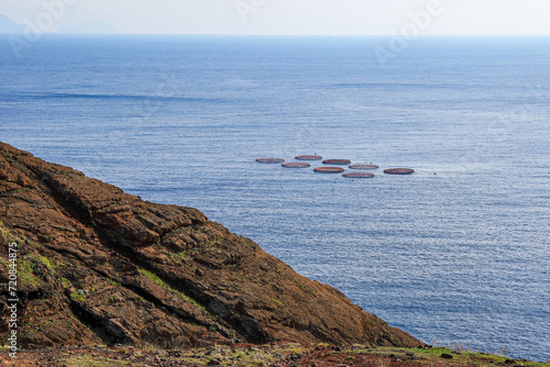 Fish farm in the waters of the Ponta de São Lourenço (tip of St Lawrence) at the easternmost point of Madeira island (Portugal) in the Atlantic Ocean photo