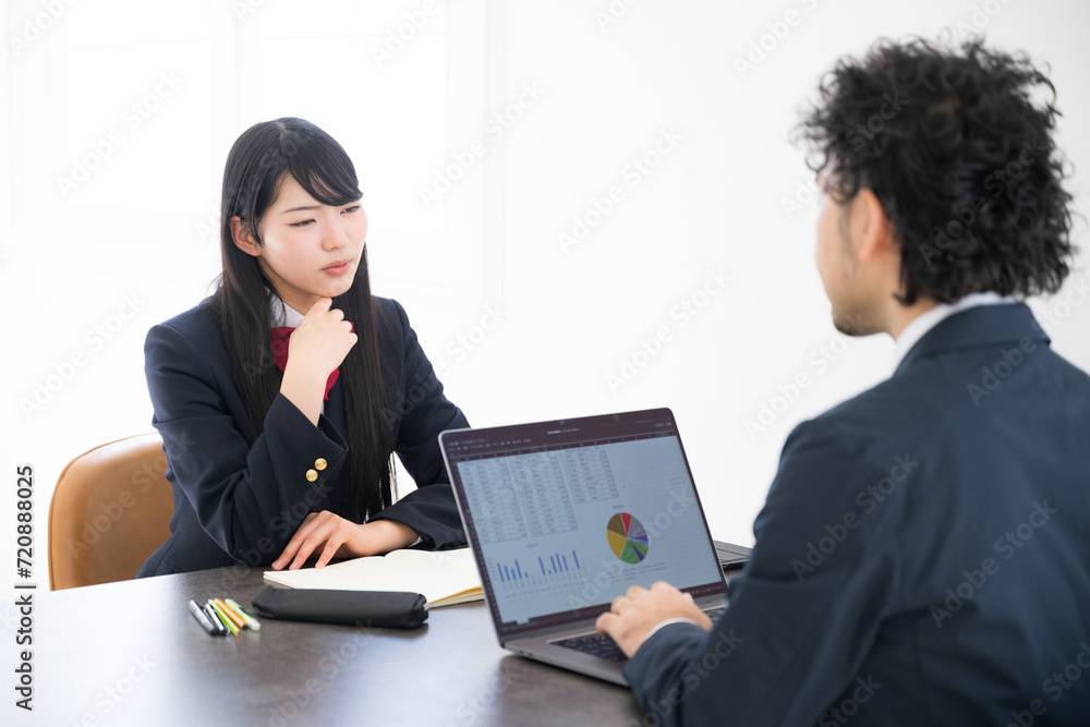 Students and teachers using computers for tutoring and career counseling interviews. Students and teachers using computers for tutoring and career counseling interviews.