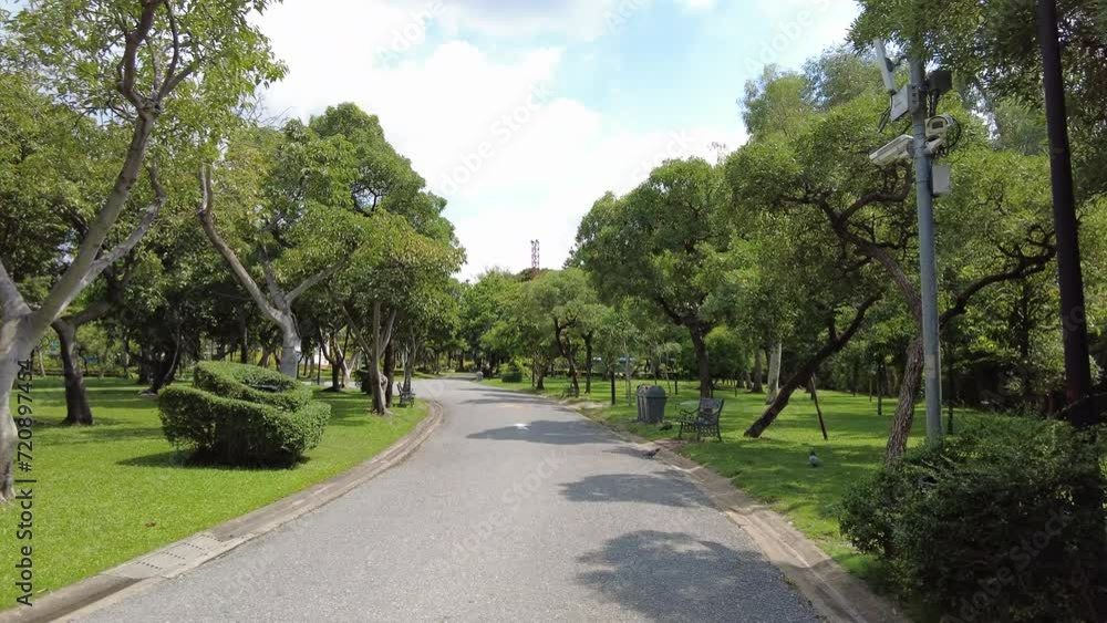 4K Walkway among the public park surrounding with trees on summer 4K Walkway among the public park surrounding with trees on summer
