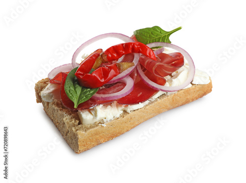 Delicious sandwich with bresaola, cream cheese, onion and chili pepper isolated on white