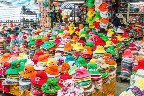 Colourful hats on a market stall