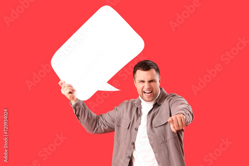 Angry young man with blank ...