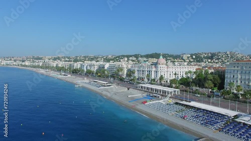 Townscape with transport traffic on English Promenade near hotel Negresco photo