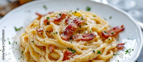 Delicious Carbonara Pasta with Crispy Bacon and Creamy White Sauce - A Mouthwatering Dish