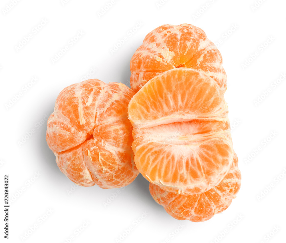 Fresh peeled tangerines on white background