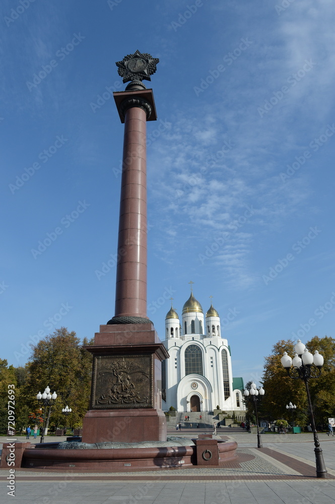 View of the Triumphal Column and the Cathedral of Christ the Savior on Victory Square in Kaliningrad