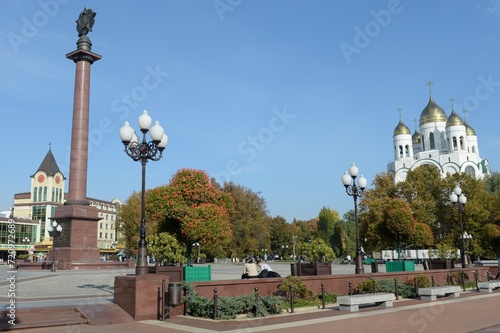 View of the Triumphal Column and the Cathedral of Christ the Savior on Victory Square in Kaliningrad photo
