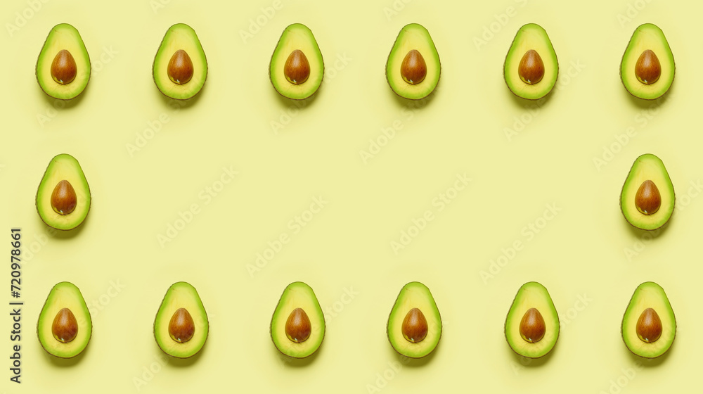 Fototapeta premium Avocado pattern on yellow background. Flat lay, top view minimal concept.